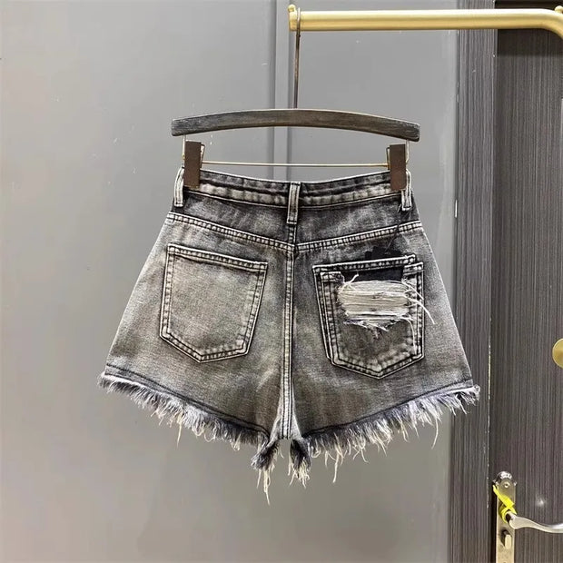 Washed Black Denim A-line Shorts for Women with Ripped Hole and Rough Edges Perfect for Summer 2025 New Fashion