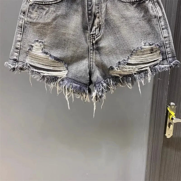 Washed Black Denim A-line Shorts for Women with Ripped Hole and Rough Edges Perfect for Summer 2025 New Fashion