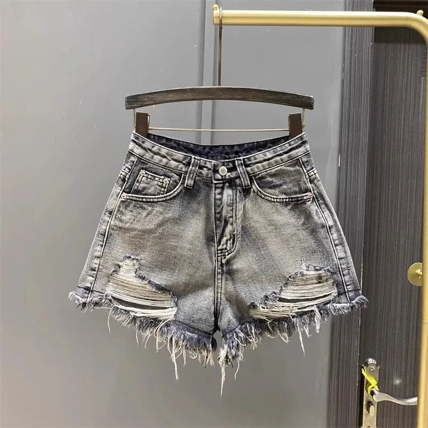 Washed Black Denim A-line Shorts for Women with Ripped Hole and Rough Edges Perfect for Summer 2025 New Fashion