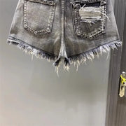 Washed Black Denim A-line Shorts for Women with Ripped Hole and Rough Edges Perfect for Summer 2025 New Fashion